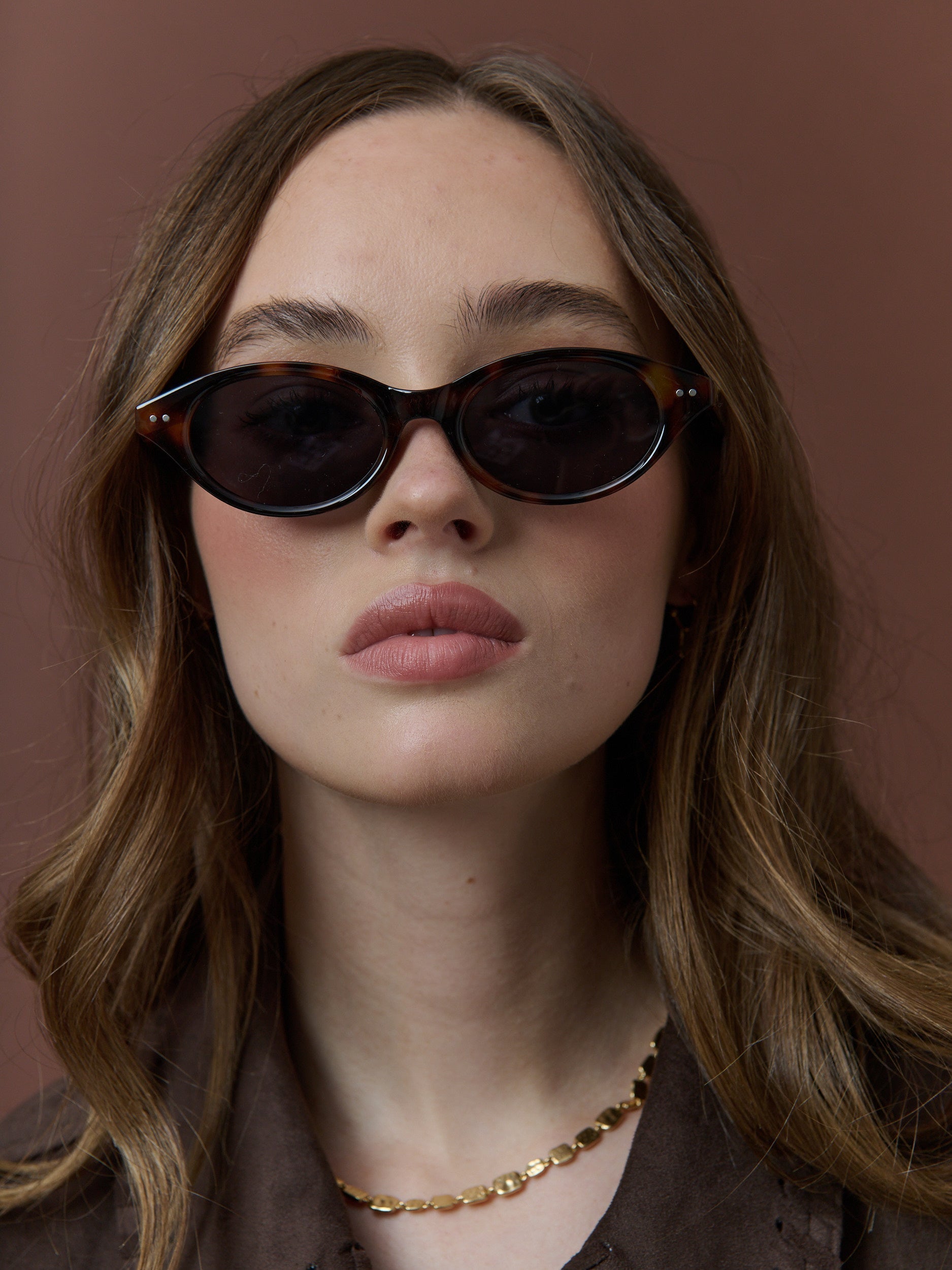 Aire Sleek Oval Sunglasses