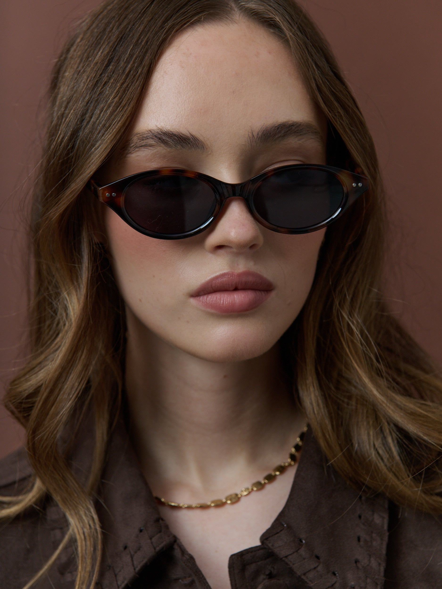 Aire Sleek Oval Sunglasses